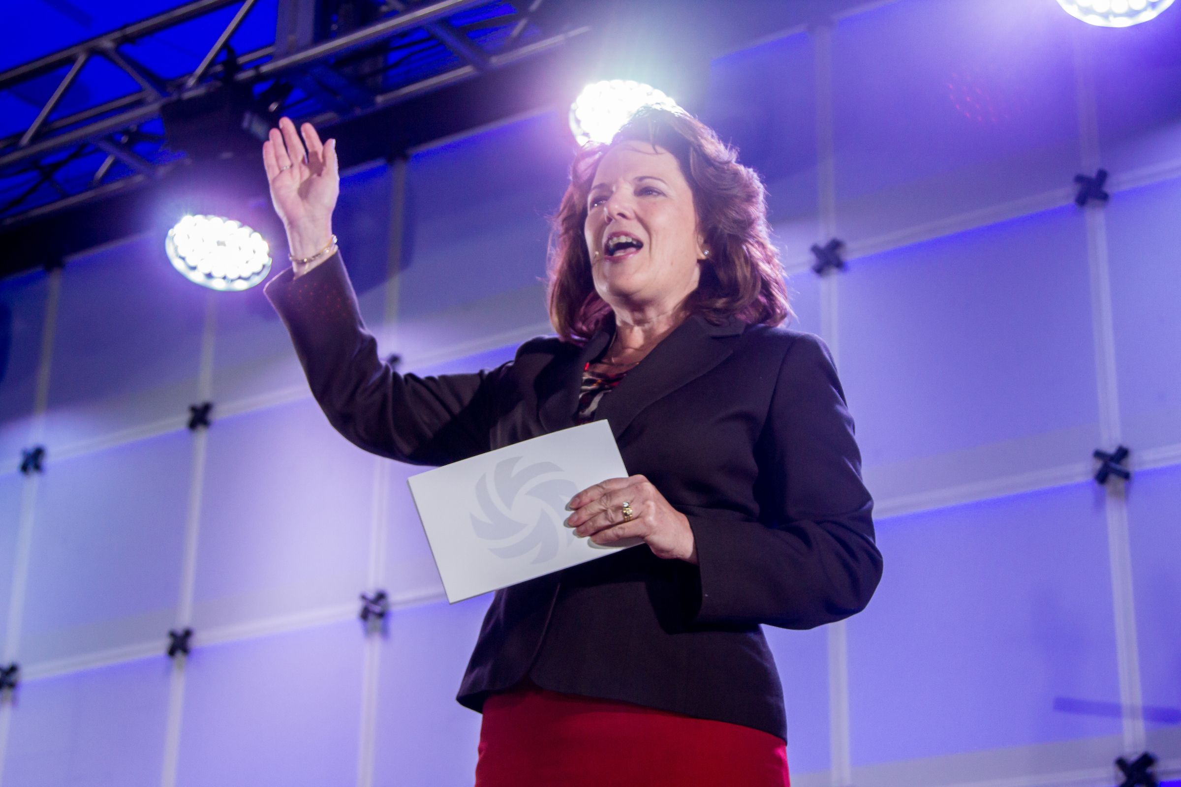 woman speaking at conference